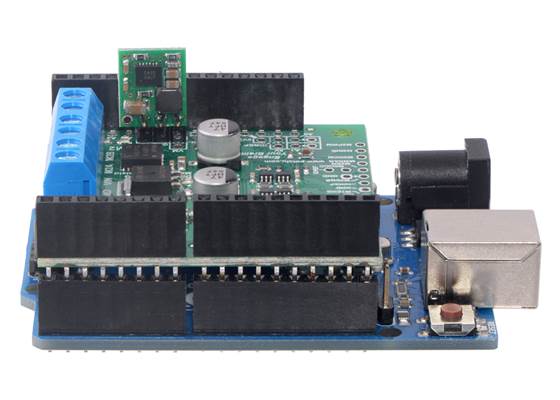 Using a voltage regulator with the Dual TB9051FTG Motor Driver Shield to power the Arduino.