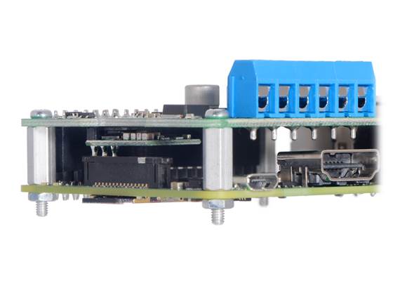 D24V10F5 5V 1A step-down voltage regulator soldered directly to Dual TB9051FTG Motor Driver for Raspberry Pi (compact, permanent connection).