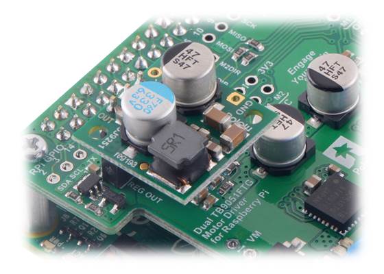 D24V22F5 5V 2.5A step-down voltage regulator plugged into a Dual TB9051FTG Motor Driver for Raspberry Pi (temporary connection).