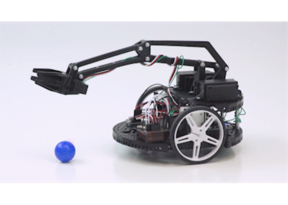 Picking up a 1″-diameter ball with the Romi arm.