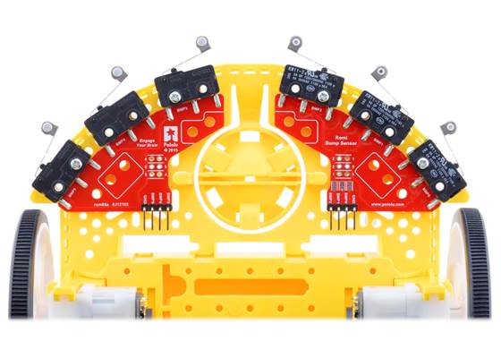 Left and right bumper switch assemblies mounted on a Romi chassis.