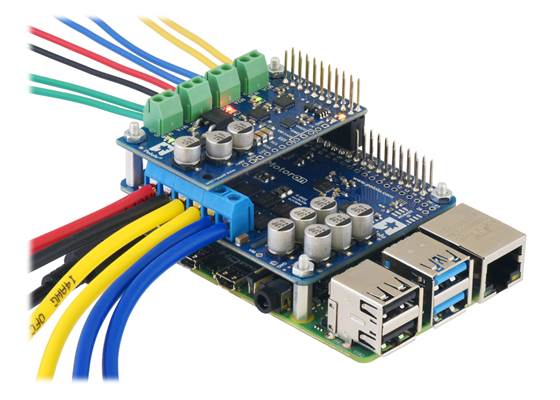 A Motoron M2H and a Motoron M3H256 being controlled by a Raspberry Pi, allowing for independent control of five motors.