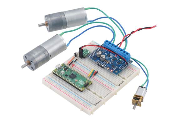 A Raspberry Pi Pico on a breadboard using a Motoron M3S550 shield to control three motors.
