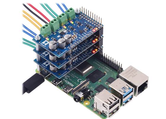 Three Motoron M3H550 controllers being controlled by a Raspberry Pi.