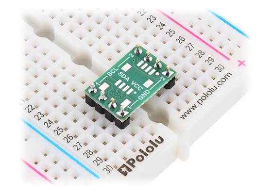 Pololu I²C Isolator, ISO1640, on a breadboard (version without connectors shown, headers not included).