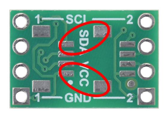 The tightest clearance on the Pololu I²C Isolator ISO1640 is between these sets of pads, which are 2&nbsp;mm apart.