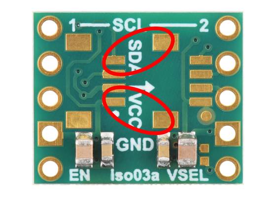 The tightest clearance on the Pololu I²C Isolator with Isolated Power is between these sets of pads, which are 2&nbsp;mm apart.