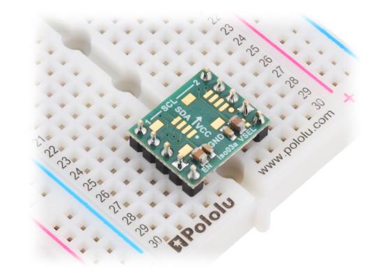 Pololu I²C Isolator with Isolated Power, ISO1640, MIE1W0505BGLVH, on a breadboard (version without connectors shown, headers not included).