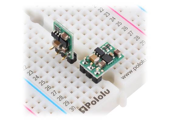 D45V5Fx step-down voltage regulators, soldered with straight and right-angle headers (not included), on a breadboard.