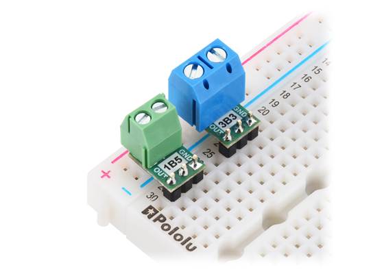 ACS3704x Current Sensor Micro Carriers soldered with 3.5mm-pitch (left) and 5mm-pitch (right) terminal blocks for connecting input current and 0.1″ male headers for VOUT, VDD, and GND.  (Headers and terminal blocks not included.)