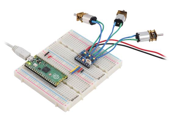 A Raspberry Pi Pico on a breadboard using a Motoron M3T453 Triple I²C Motor Controller with Soldered Headers to control three motors.