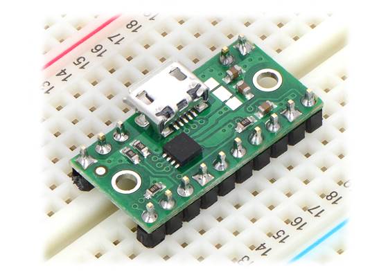 TPS2113A power multiplexer carrier with USB Micro-B connector in a breadboard.