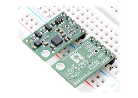 Two Pololu MinIMU-9 v5 modules in a breadboard.