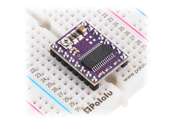 TB67S581FNG Stepper Motor Driver Carrier with soldered header pins in a breadboard.