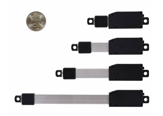Glideforce GF01 Micro Linear Actuators, retracted, with a US quarter for size reference.