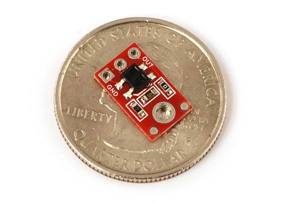 QTR-1A reflectance sensor on a quarter for size reference.