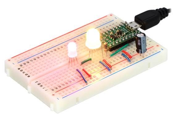 Two addressable RGB LEDs (#2535 and #2536) on a breadboard, controlled by an A-Star 32U4 Micro.