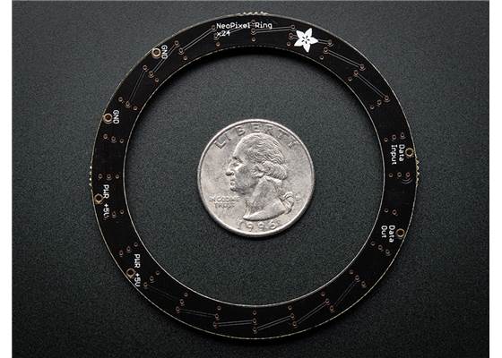 Adafruit 24-LED NeoPixel ring, bottom view with a US quarter for size reference.