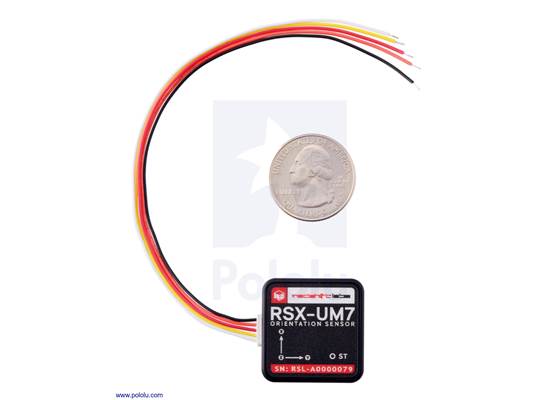 UM7 orientation sensor (with bracket plate removed) with included cable and U.S. quarter for size reference.