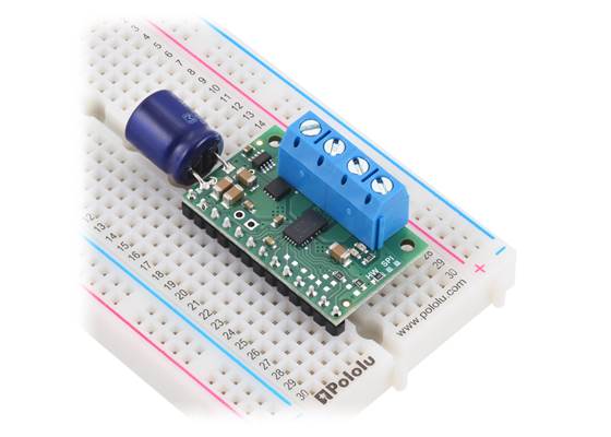 DRV8263H Single Brushed DC Motor Driver Carrier soldered with added input capacitor, 0.1″ headers, and 5mm-pitch terminal blocks (not included).